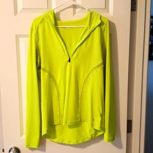 Neon green Activewear top with hood.
